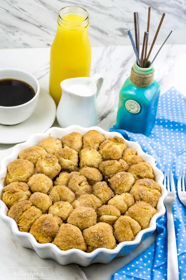 Baked donut holes with orange juice and coffee