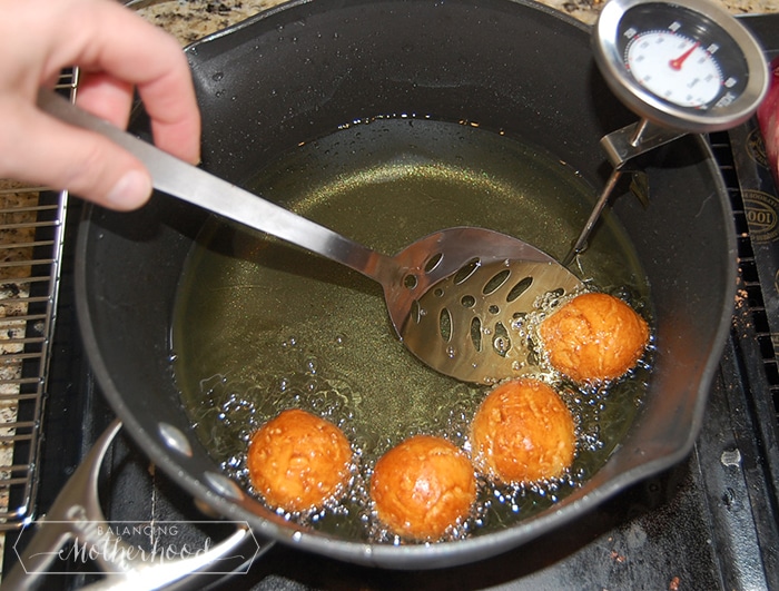 frying donuts to make boston creme donut holes
