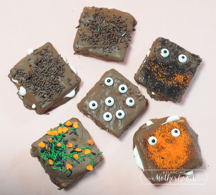 chocolate-covered smores with monster eyes