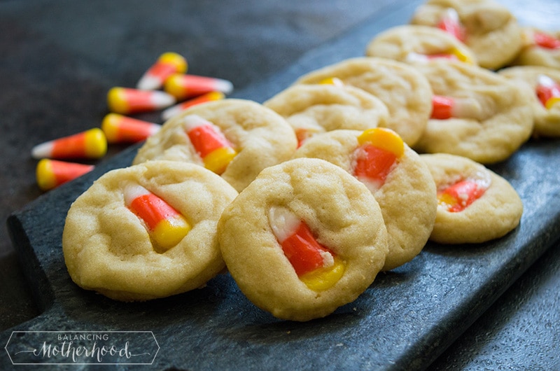 Halloween cookies on tray with candy corns
