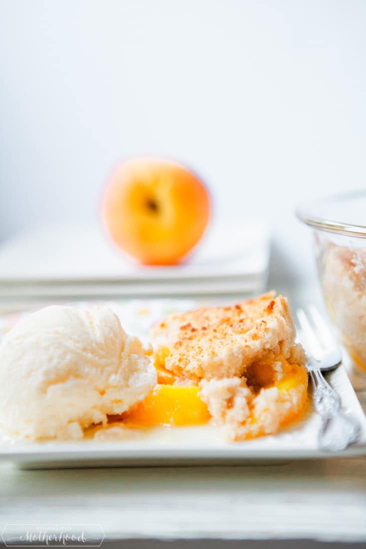 fresh peaches with peach cobbler and vanilla ice cream