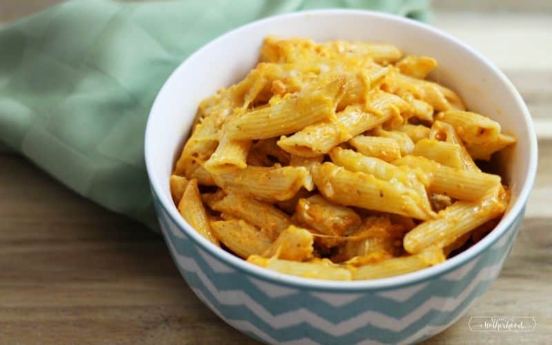 buffalo chicken pasta in bowl with napkin