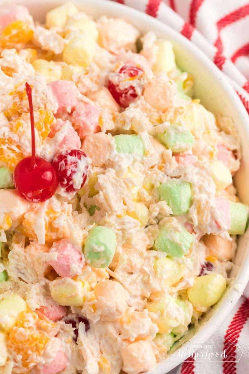 close up of ambrosia salad with cherry on top
