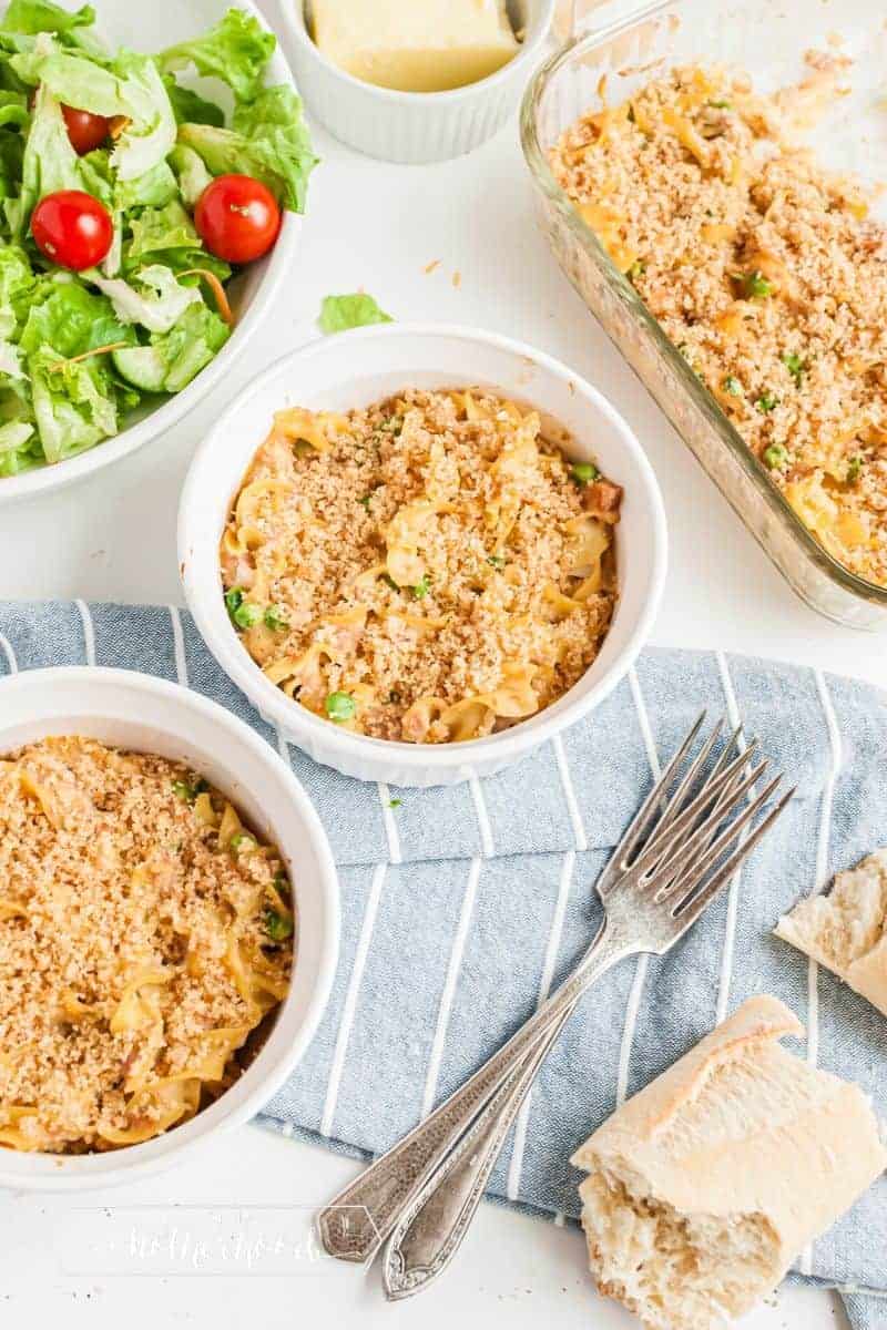 two bowls of tuna casserole with salad