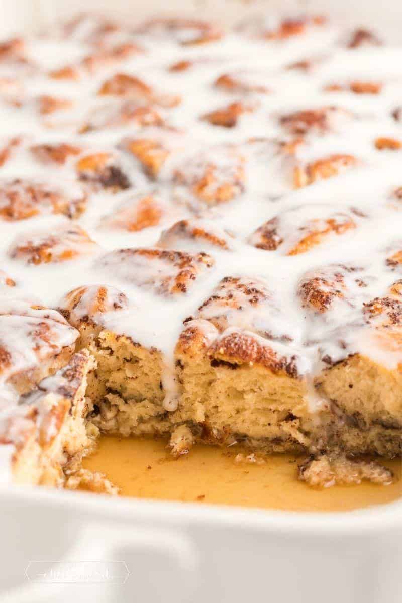 inside of cinnamon roll casserole with maple syrup