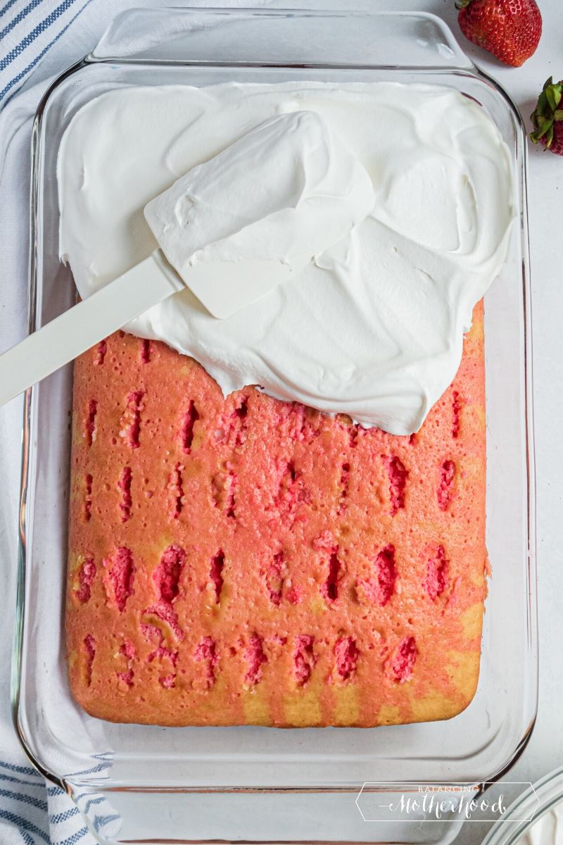 frosting cake with spatula