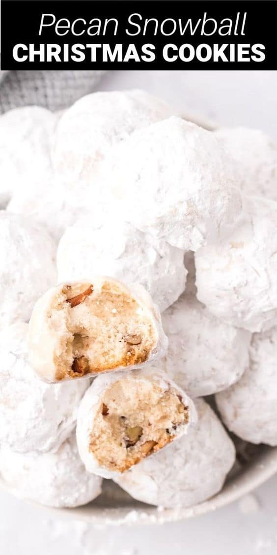 Snowball cookies are a Christmas classic made with powdered sugar and creamy butter with crushed pecans. All rolled in more powdered sugar for the perfect holiday cookie!