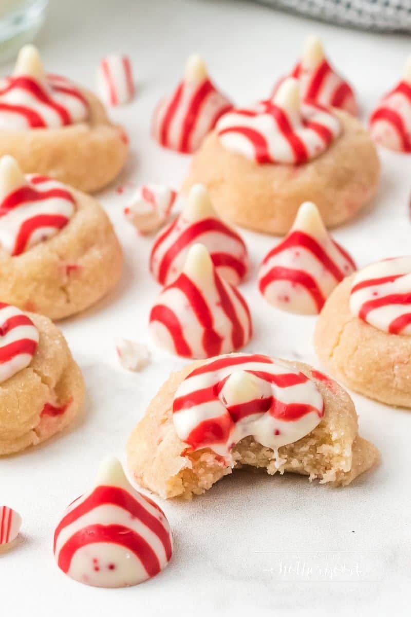 cookies on table with peppermint kisses on the side. 