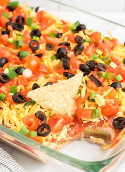 Mexican dip in a glass baking dish.