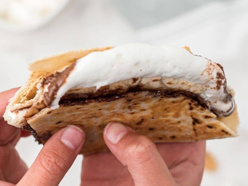 s'mores tortilla folded with marshmallows melting out