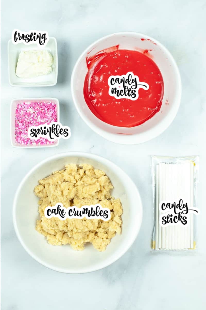 cake pop ingredients: cake crumbles, candy melts, frosting, sprinkles, candy sticks