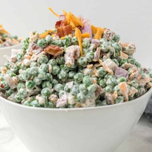 white bowl with pea salad