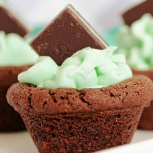 chocolate cookie cup with green frosting and Andes mint