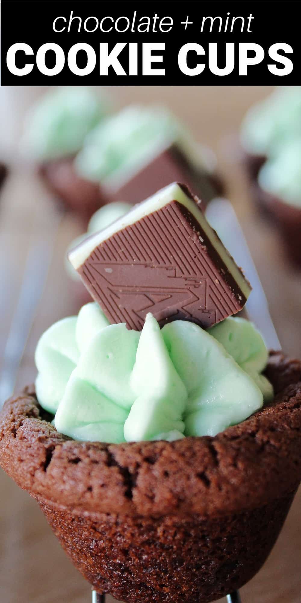 Chocolate mint cookie cups are a simple chocolate cookie dough pressed into a mini-muffin pan making a hole to fill with creamy mint buttercream frosting. Topped with an Andes mint, these are a cute chocolate mint dessert.