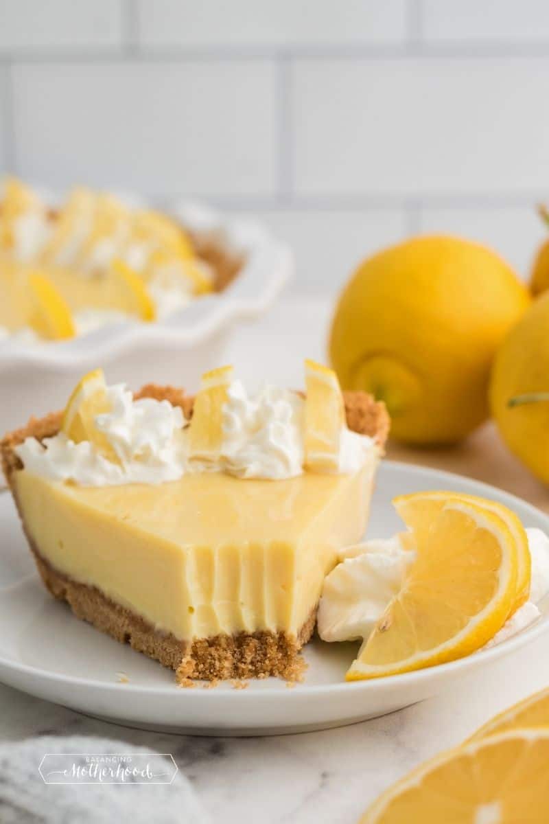 slice of lemon pie with bite out of the tip