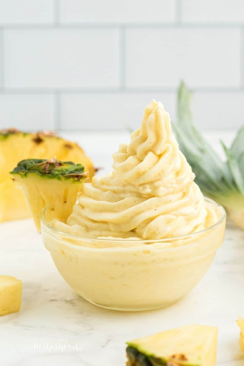 glass bowl with pineapple dole whip
