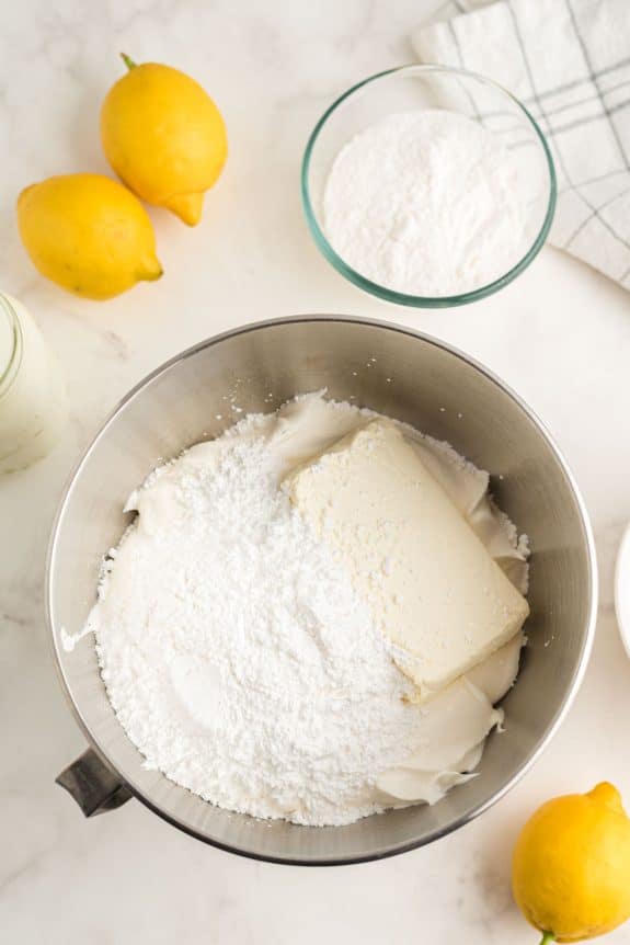 Lemon Lush is a bowl filled with flour, sugar and lemons.