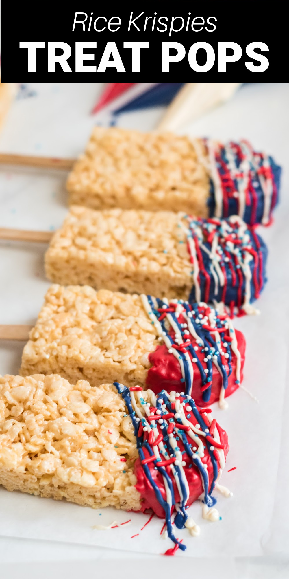 Fourth of July krispy treats are a fun way to eat one of favorite desserts: Rice Krispies Treats! We've made rice krispies pops and decorated with red, white, and blue chocolate and patriotic sprinkles! 
