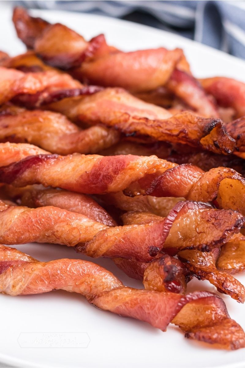 bacon twists on white plate