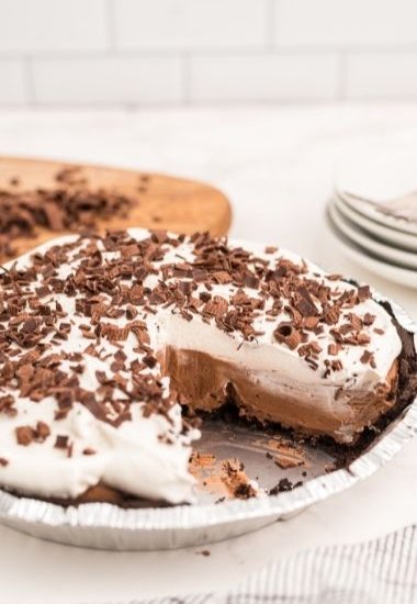 chocolate cream pie with slice taken out