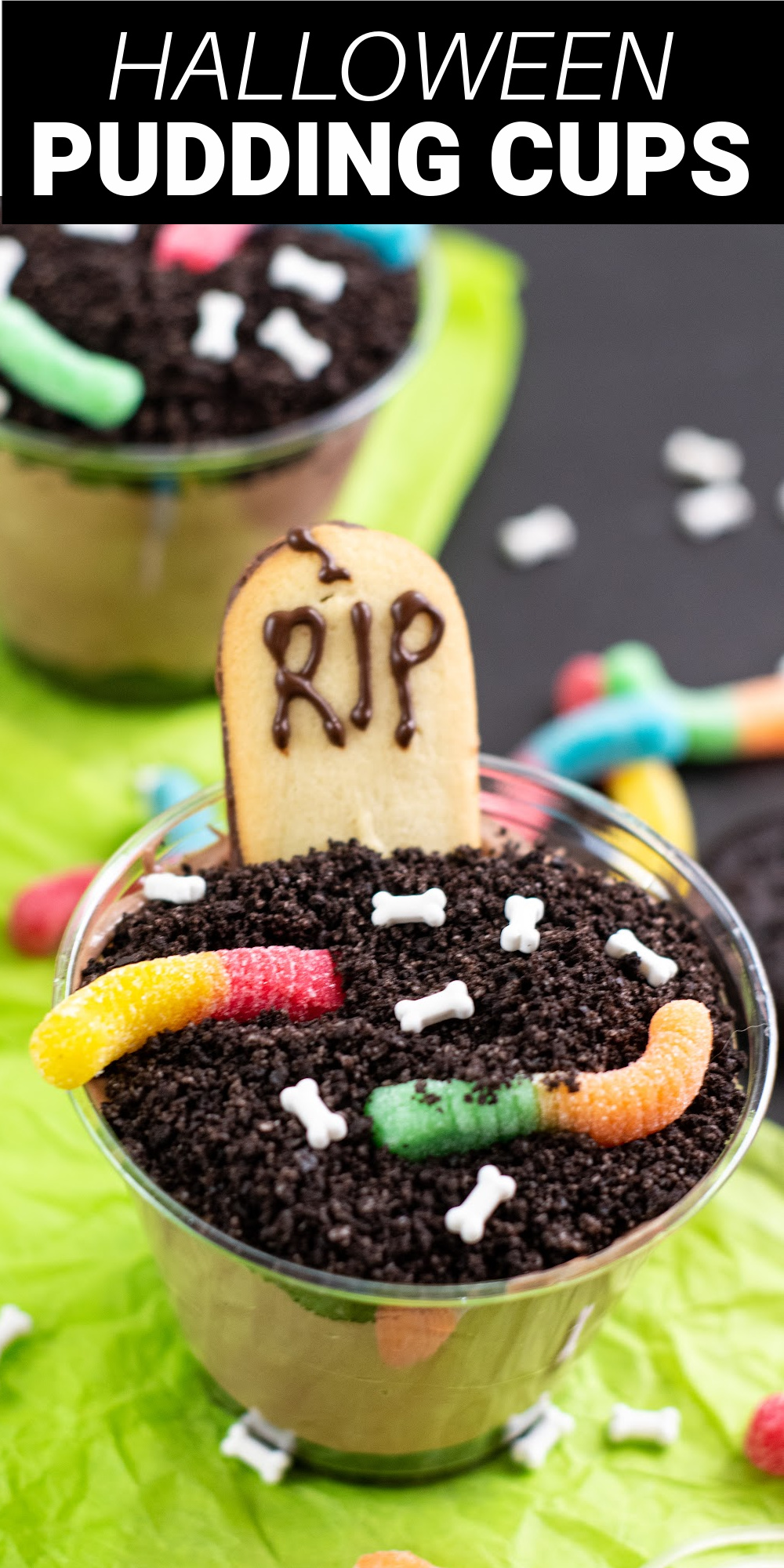 Graveyard Dirt Cups are a fun dessert perfect for a Halloween party or a silly treat at home. These pudding cups are filled with crushed Oreos, chocolate pudding, Cool Whip, and fun treats on top.