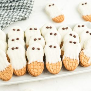 nutter butter ghosts on white plate