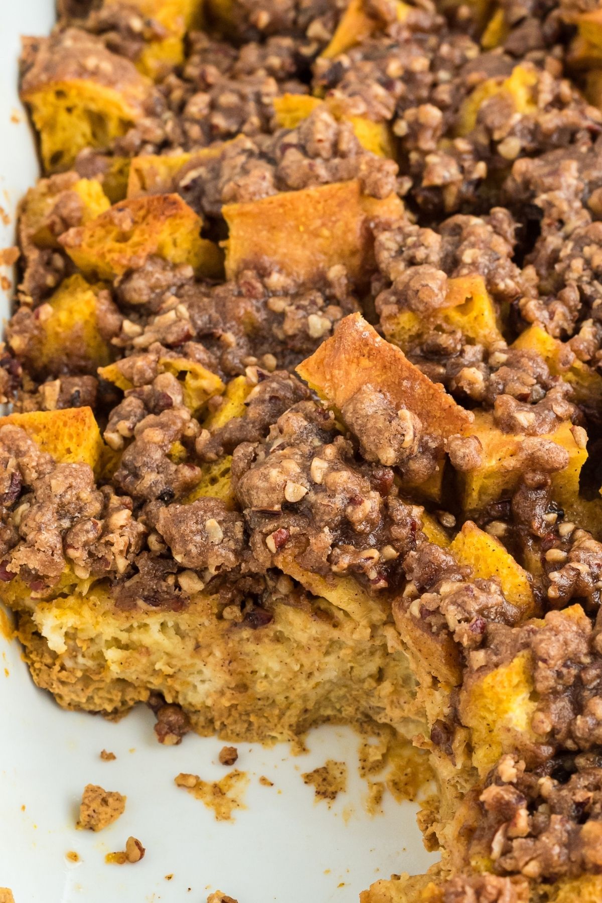 close up of baked casserole with a slice removed