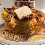 slice of pumpkin french toast casserole with butter