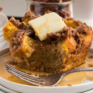 slice of pumpkin french toast casserole with butter
