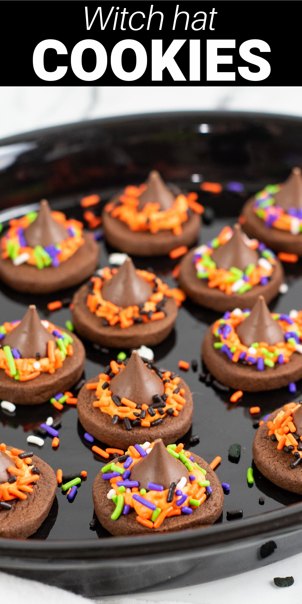 Witch hat cookies are a simple and fun treat that's perfect for Halloween. The base is a chocolate cookie topped with a creamy homemade buttercream frosting and a Hershey's kiss. 