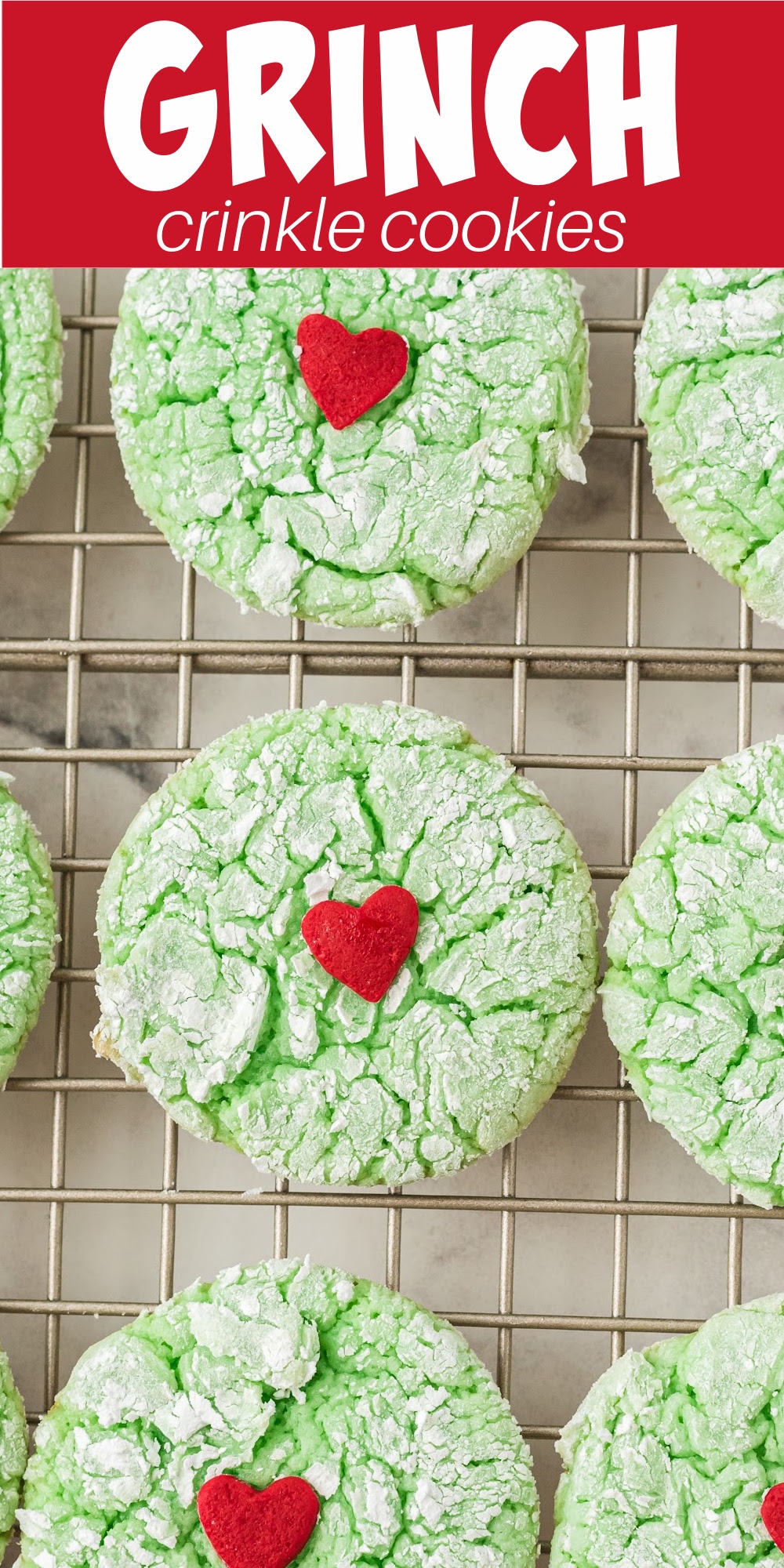 Grinch crinkle cookies are an easy cake mix cookie that's soft and delicious! These fun treats have a huge red sprinkle in the center of the soft cookie that kids and adults love.