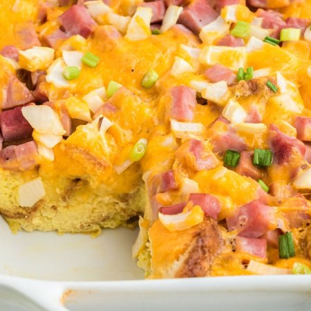 close up of baked ham and cheese casserole showing the bread on the inside