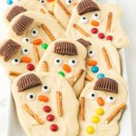 white chocolate bark with pretzel sticks, and sprinkles that look like a melted snowman