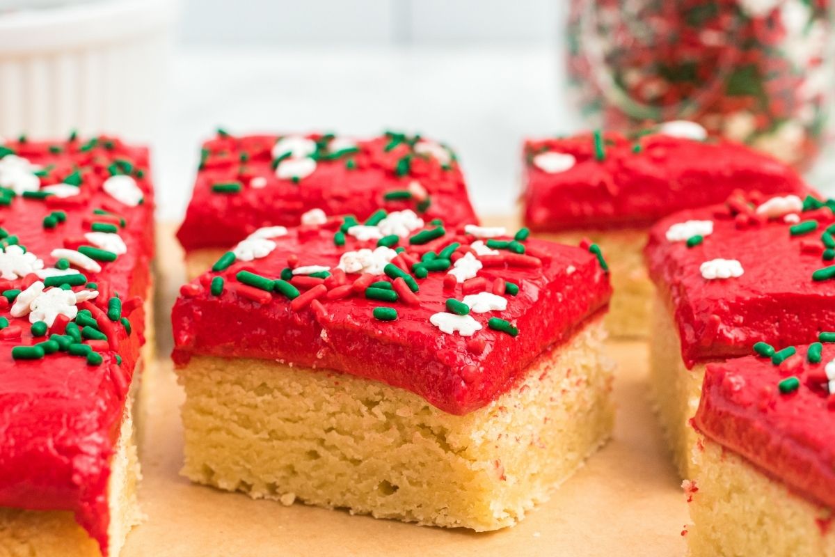 bed frosted sugar cookie squares with red and green sprinkles
