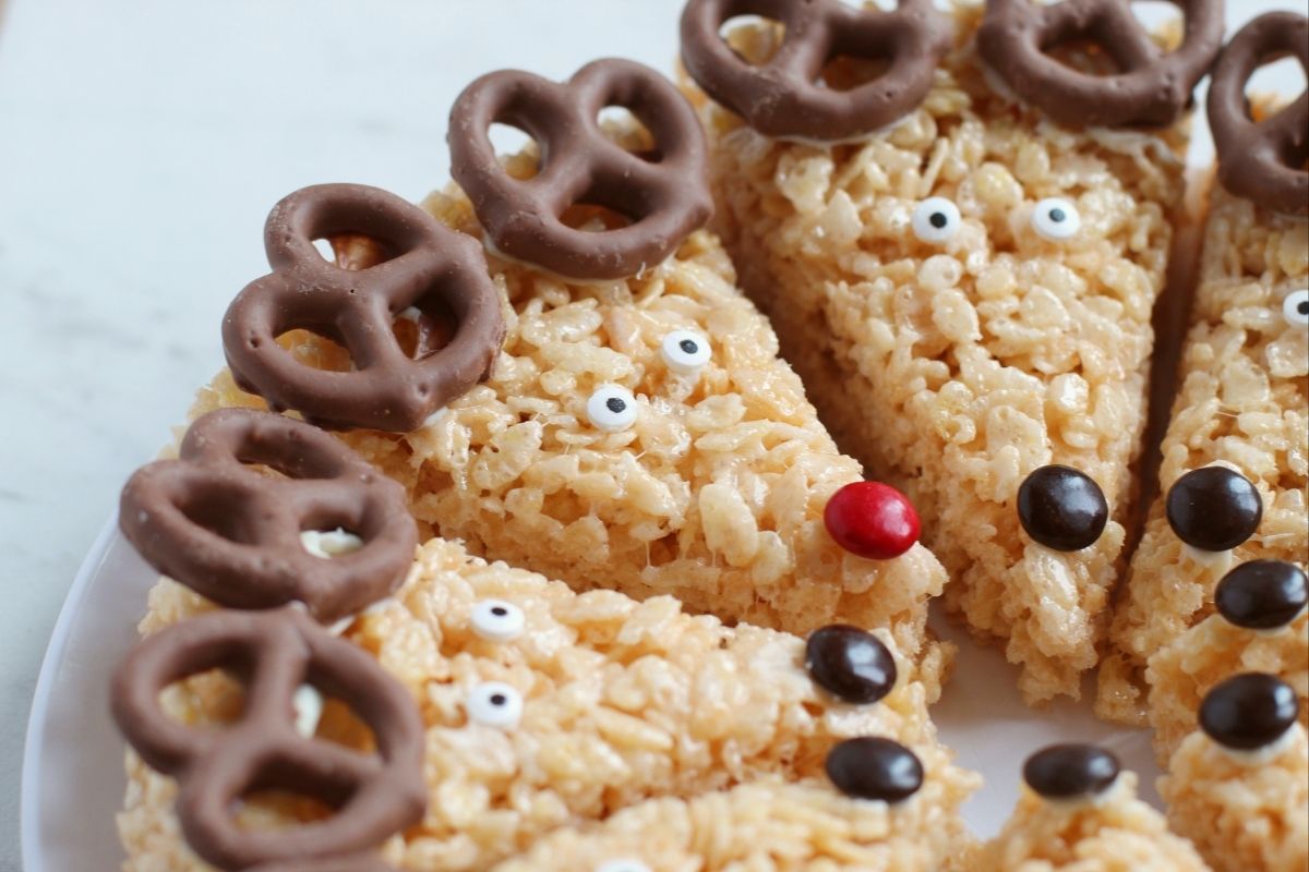triangle rice krispie treats with brown noses and chocolate-covered pretzel ears