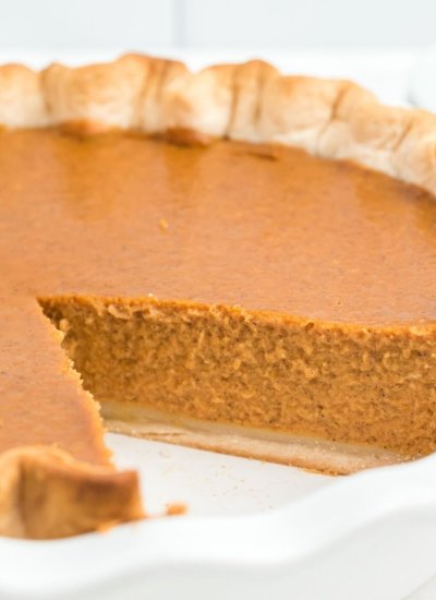 pumpkin pie with slice out