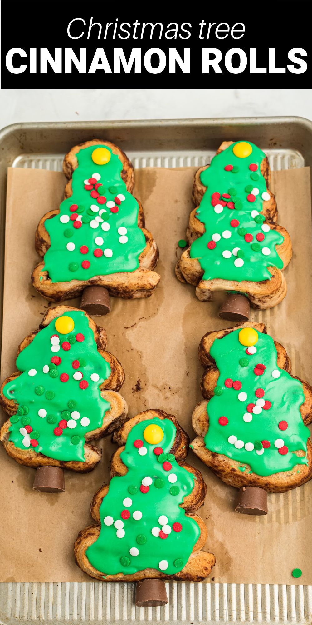 Surprise your family this holiday season when you take ordinary cinnamon rolls to a whole new level with these festive Christmas Tree Cinnamon Rolls. They are super easy to make, and the kids will just love them.