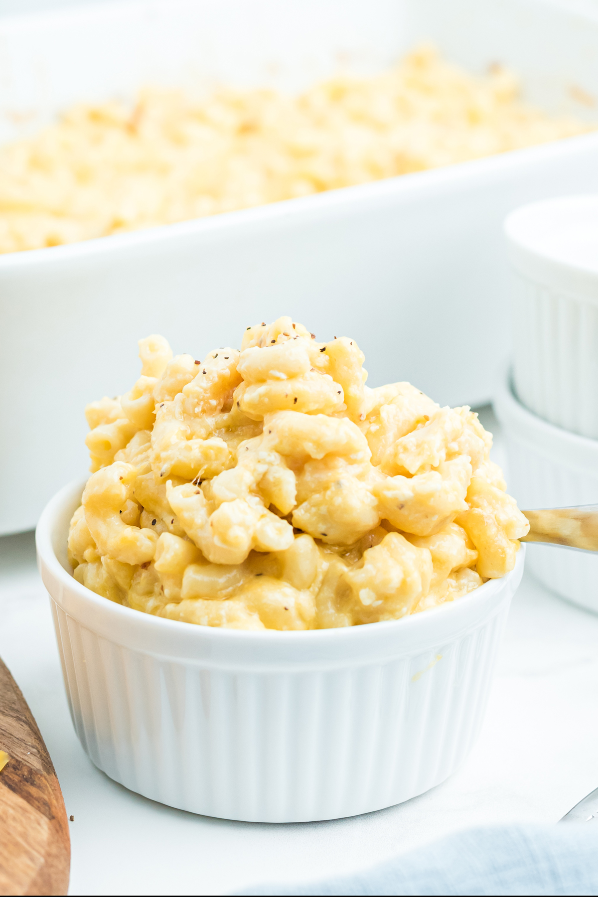 An upclose photo of easy baked mac and cheese on a white ramekin
