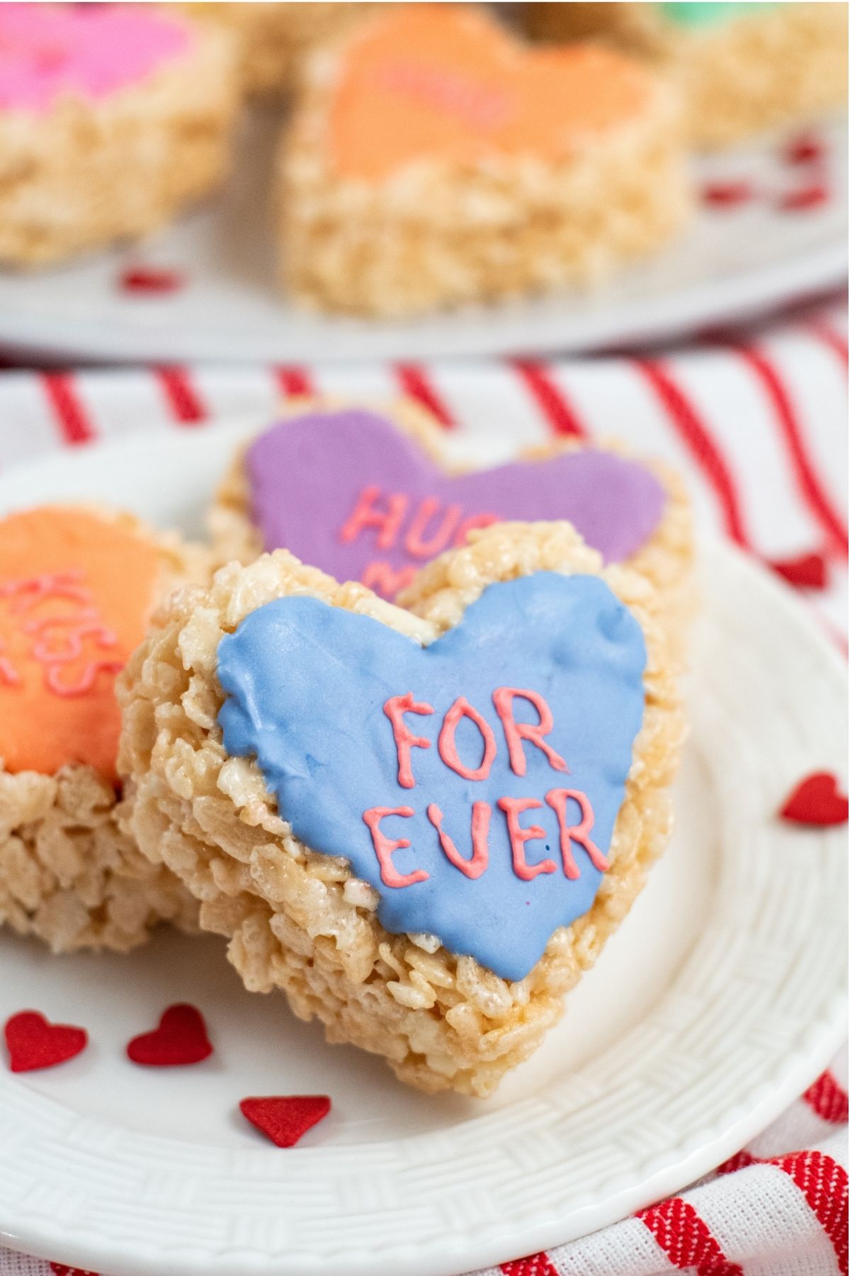 heart-shaped krispie treats with blue chocolate and letters FOREVER