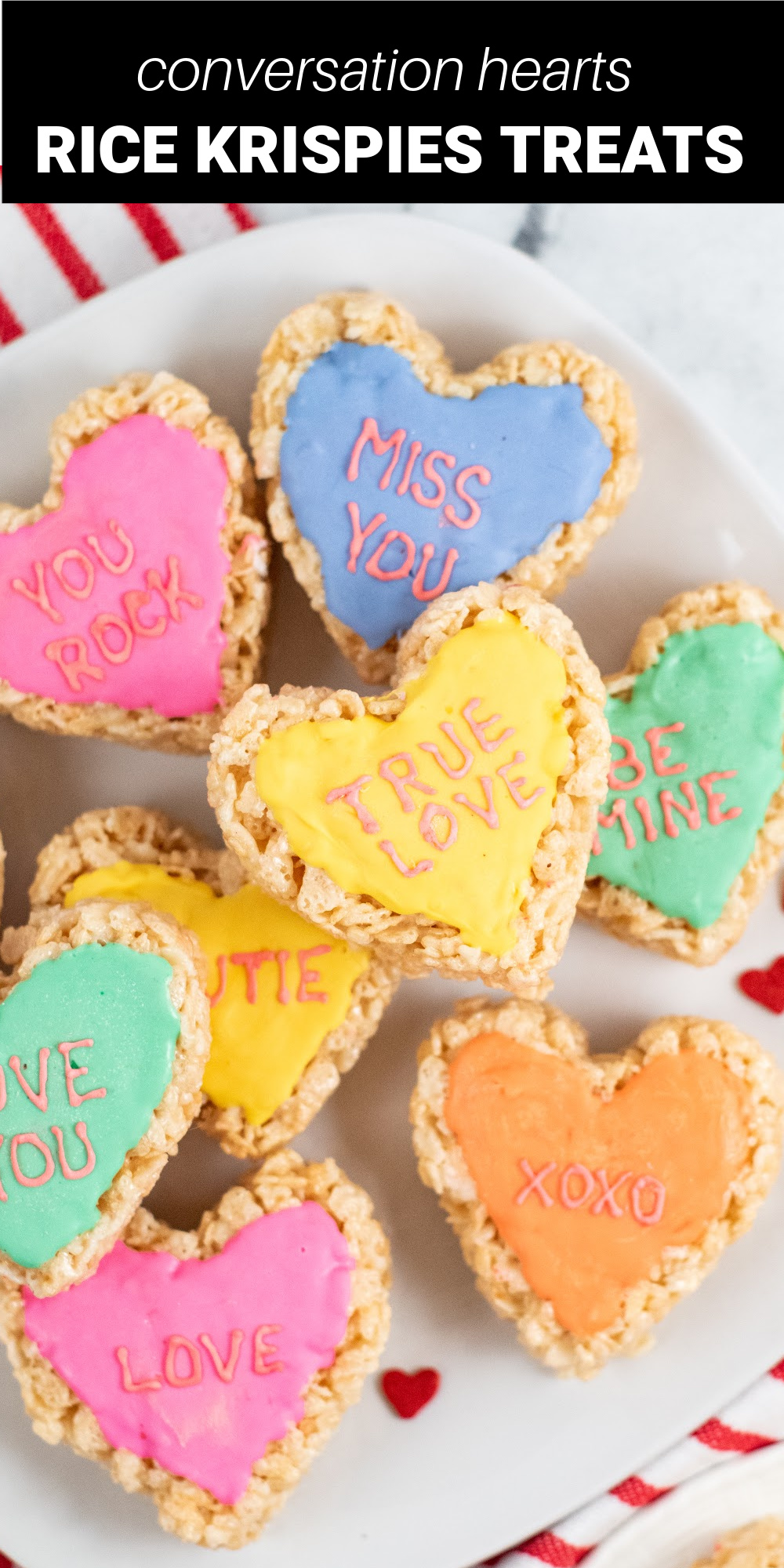 Rice Krispie treat conversation hearts are a fun play on the traditional Valentine's Day candy. Rice Krispie cereal is added to melted marshmallows and butter then topped with colorful white chocolate to make a delicious chewy and sweet treat!