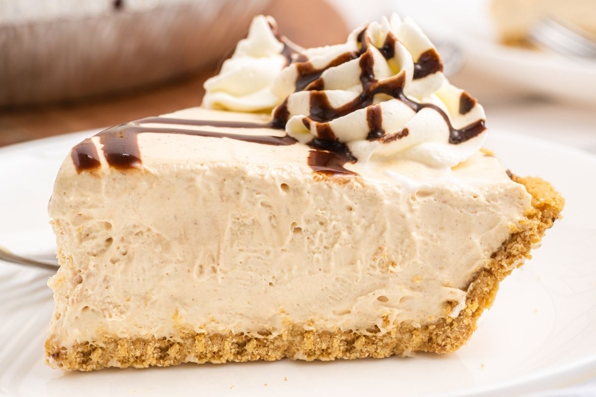 side of a slice of peanut butter pie, thick and creamy