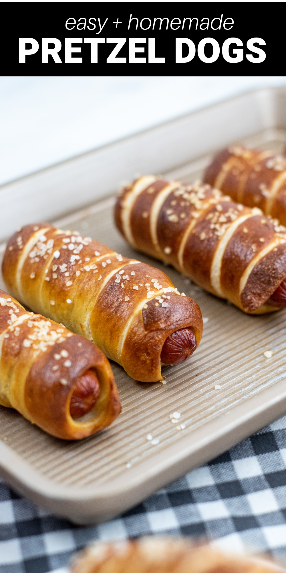 These homemade Pretzel Dogs are absolutely delicious! With the perfect combination of a chewy soft pretzel and a juicy hot dog, they make a great lunch, dinner or party food that’s sure to be a hit with kids and adults alike.