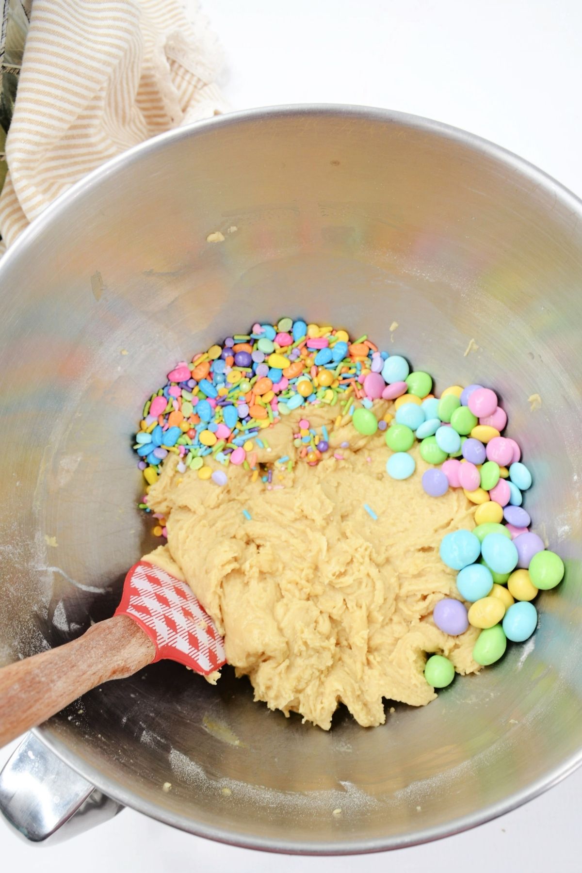 cookie batter with pastel M&Ms and Easter sprinkles