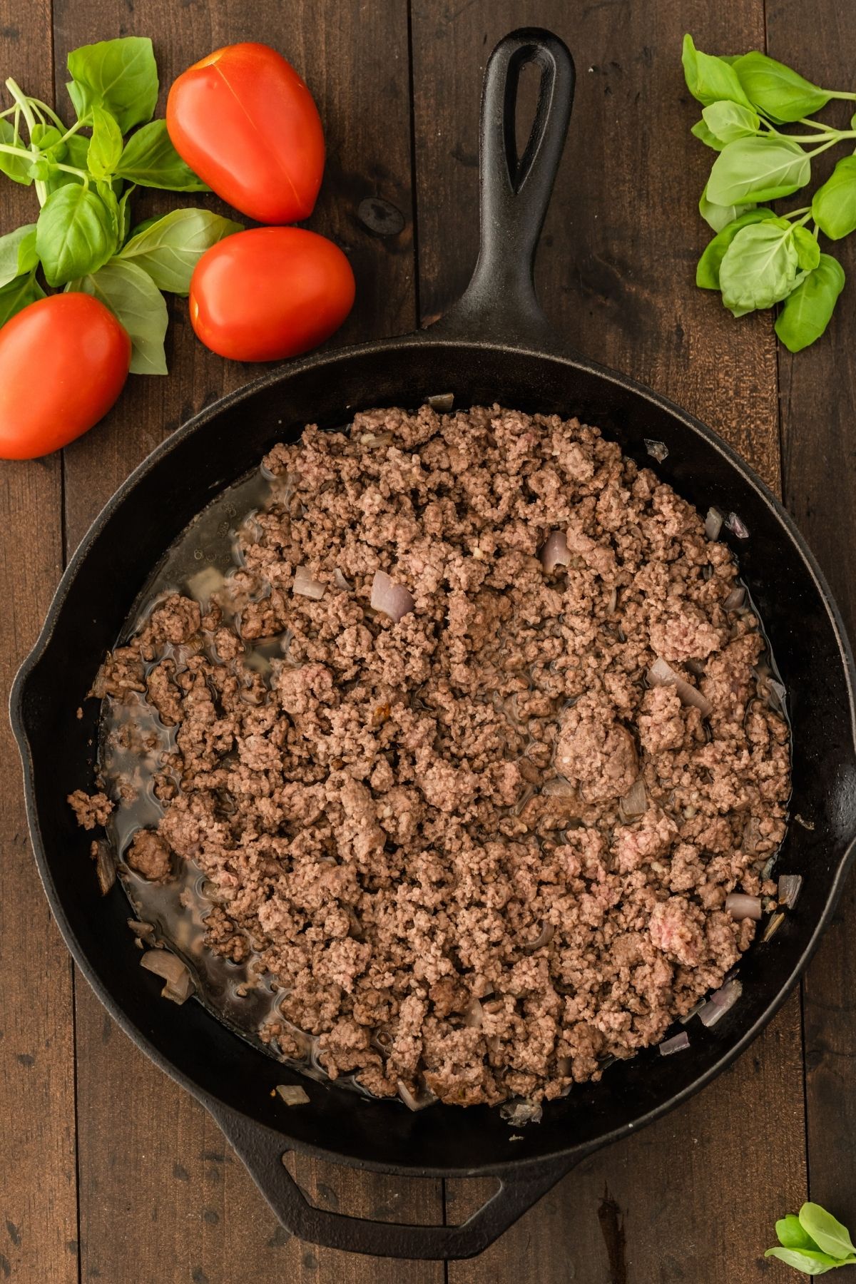 cooked ground beef in cast iron skillet
