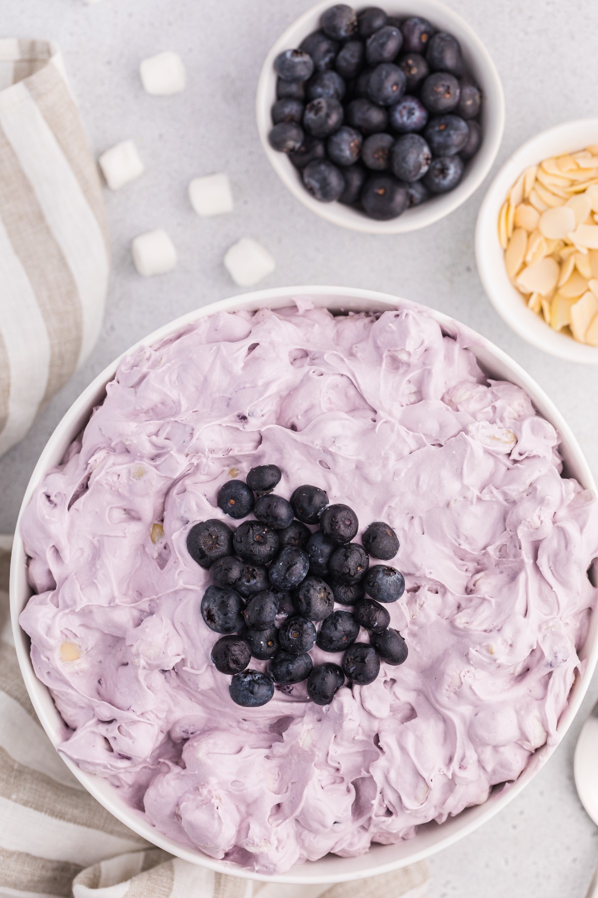 Blueberry Fluff Salad on a white bowl