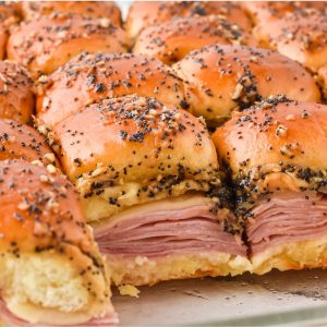 delicious ham and cheese sliders with stacked ham inside