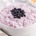 light purple fluff salad with blueberries on top