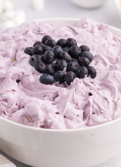 light purple fluff salad with blueberries on top
