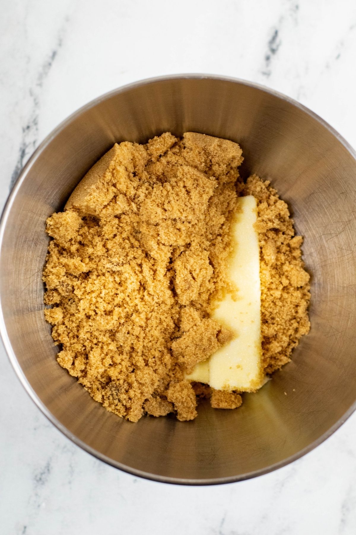 brown sugar and butter in mixing bowl