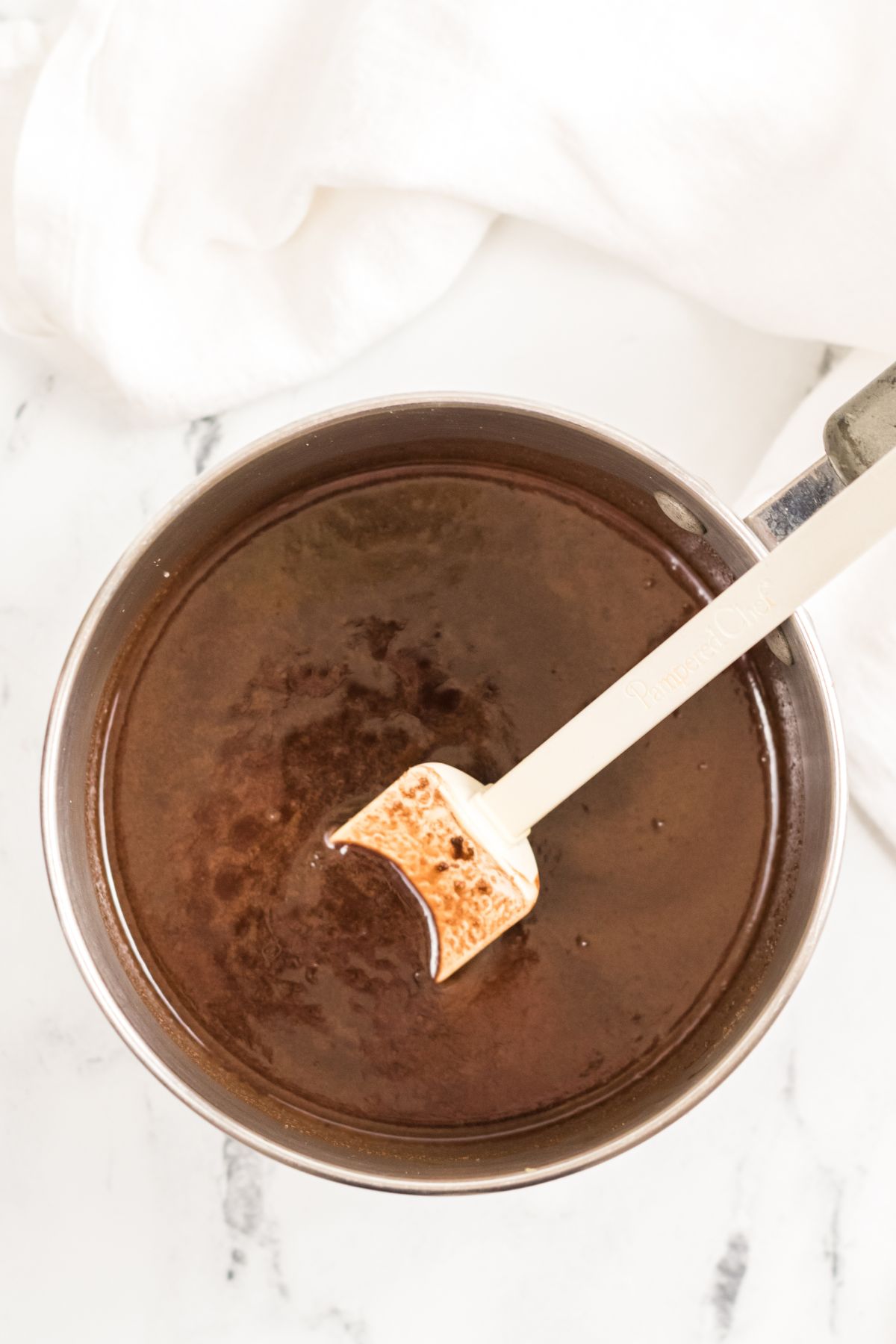 melted chocolate in pan with spatula